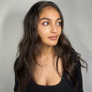 Expert brow artist creating bespoke brows for a client at Beauty Hub NZ, Auckland.