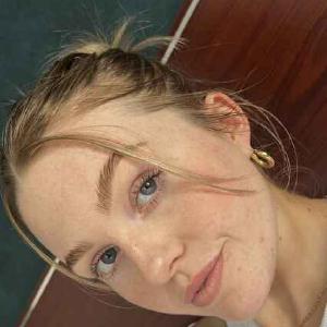 A client showcasing her beautiful new brows in Auckland.