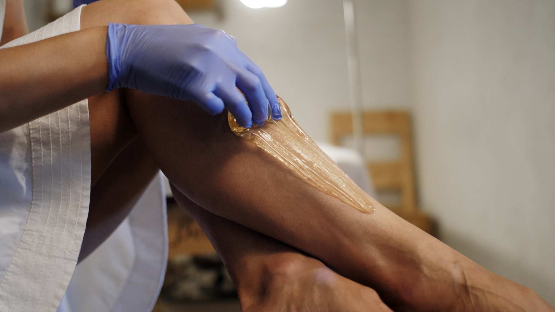 Legs waxing with sugar paste